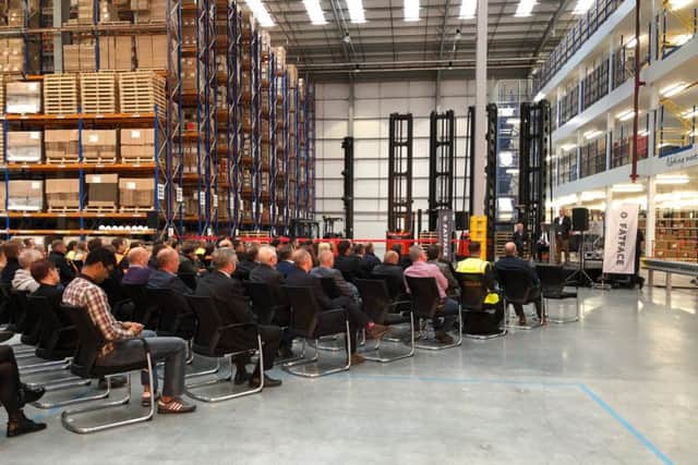 The distribution centre crew and special guests listen to FatFace's infrastructure director Simon Ratcliffe give a speech. Picture: Tamara Siddiqui