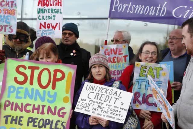 Unite the trade union holding a universal credit protest on the doorstep of Portsmouth North MP Penny Mordaunt's constituency office on November 10. Picture: Habibur Rahman