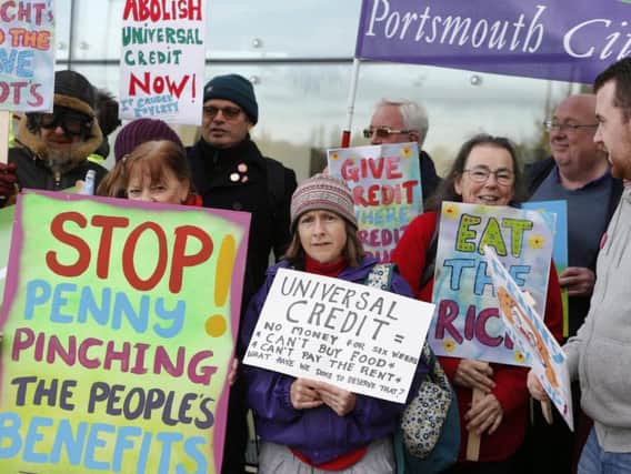 Unite the trade union holding a universal credit protest on the doorstep of Portsmouth North MP Penny Mordaunt's constituency office on November 10. Picture: Habibur Rahman