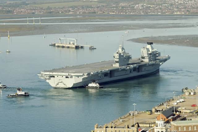 HMS Queen Elizabeth aircraft carrier leaves Portsmouth Naval Base for the first time on October 30.
Picture: Malcolm Wells