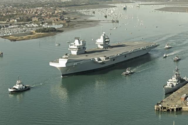HMS Queen Elizabeth leaves Portsmouth for the first time to go on sea trials

Picture: Malcolm Wells (171030-0346)