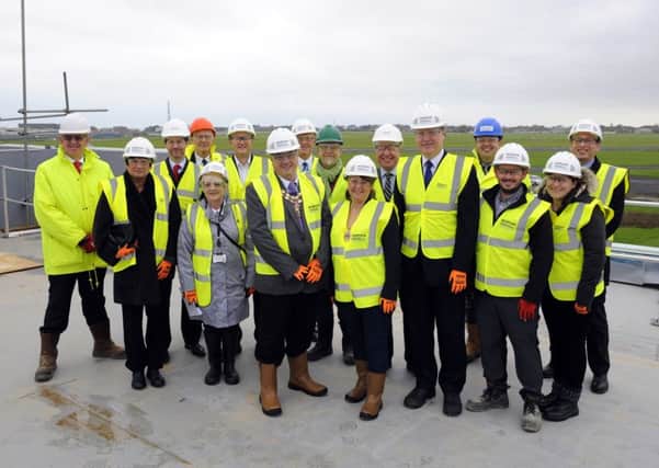 Fareham Borough Council leader Sean Woodward, mayor and mayoress Cllr Geoff  and Tina Fazackarley, with other councillors at the topping out Picture: Malcolm Wells (171120-8909)