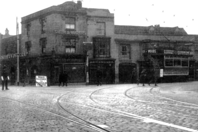 Looking south at Kingston Cross in 1928. Kingston Road has been blocked to traffic for the Fratton Road widening. (Barry Cox collection)