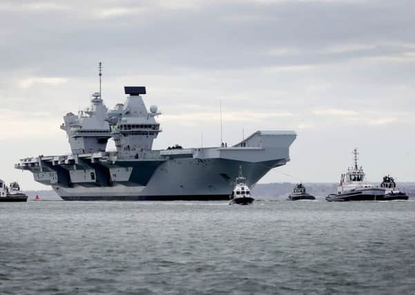 HMS Queen Elizabeth returns back to her home base in Portsmouth last year