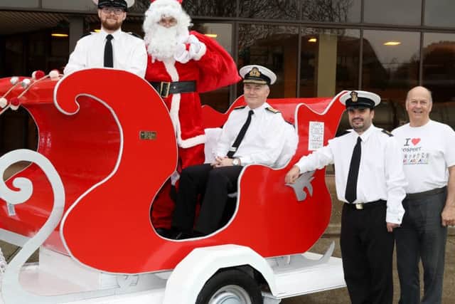 From left: PO Adam Hilton,  Father Christmas, Captain Peter Towell, CPO Chris 'Paddy' Gilkes and Malcolm Dent