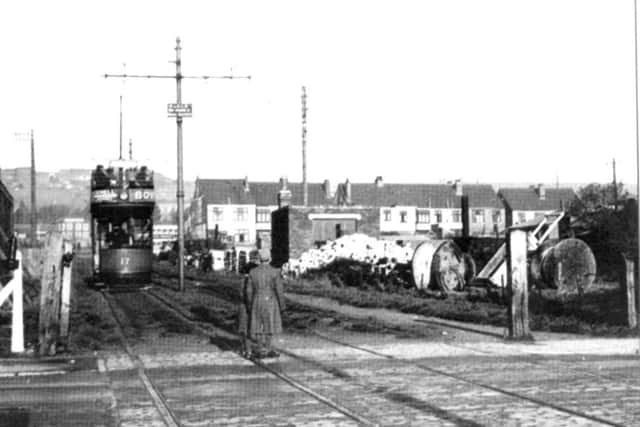 You might struggle with this scene but it is in fact looking across Waite Street, Cosham. The tram is heading for Spur Road.  Picture: Barry Cox Collection