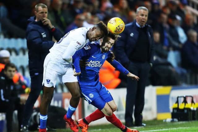 Jamal Lowe challenges for the ball