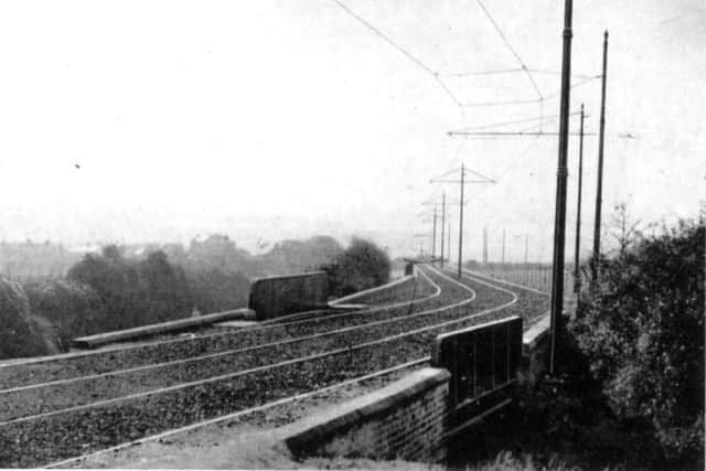 The new trackbed for the Horndean Light Railway looking south across the bridge over Southwick Hill Road, Cosham, about 1903.