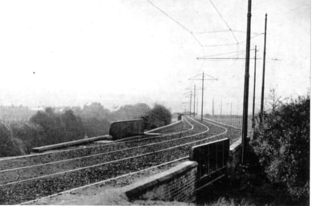 The new trackbed for the Horndean Light Railway looking south across the bridge over Southwick Hill Road, Cosham, about 1903.
