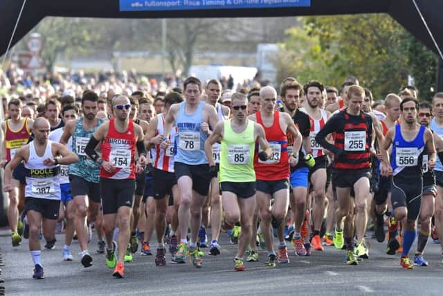 The start of the Gosport Half Marathon race as James Baker, wearing 85, hits the front early on. Picture: Neil Marshall